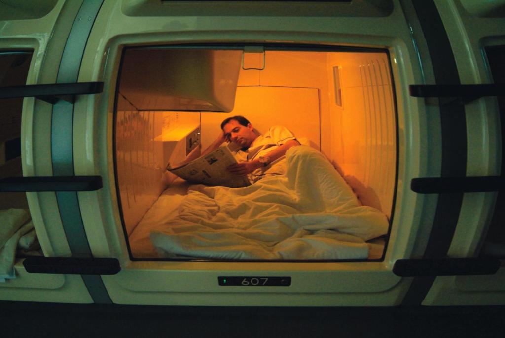 Capsule Hotel & Sauna Cosmo Plaza Akabane Токио Номер фото