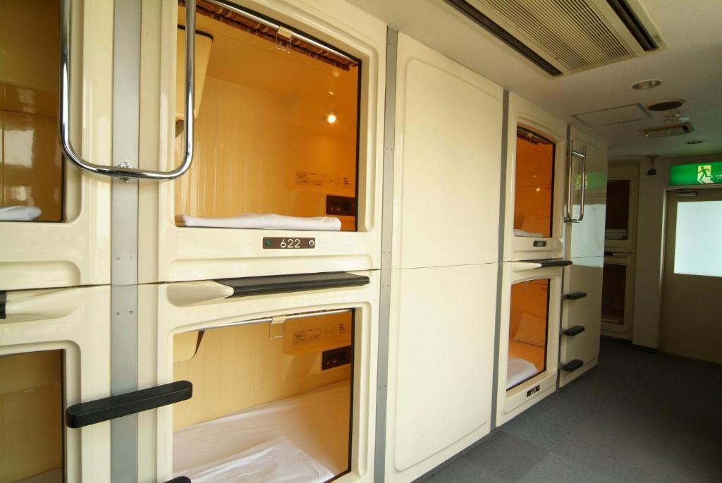 Capsule Hotel & Sauna Cosmo Plaza Akabane Токио Номер фото
